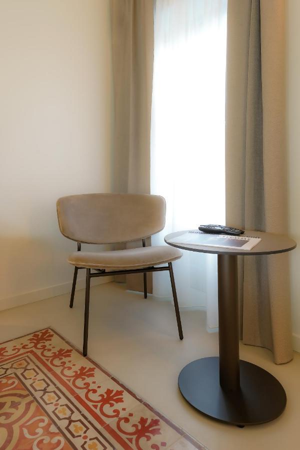 Bergamo INN 21 Esterno foto A chair