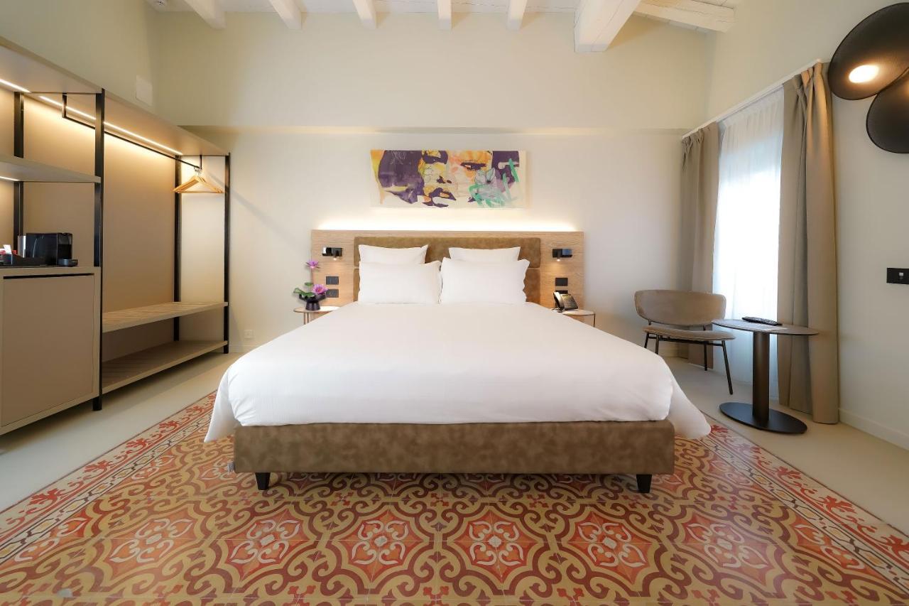 Bergamo INN 21 Esterno foto A bedroom at the hotel