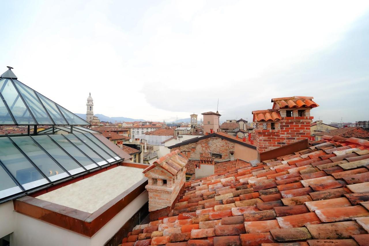 Bergamo INN 21 Esterno foto View of the roofs of the city